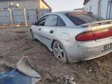 Mazda 323 1997 года за 400 000 тг. в Атырау – фото 2