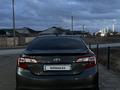 Toyota Camry 2013 года за 7 500 000 тг. в Жанаозен – фото 2