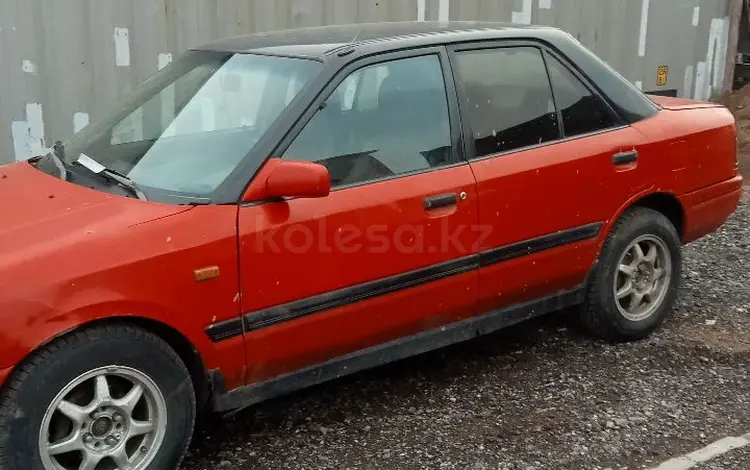 Mazda 323 1991 годаүшін550 000 тг. в Астана