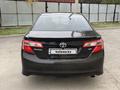 Toyota Camry 2013 года за 7 800 000 тг. в Актобе – фото 3