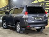 Toyota Land Cruiser Prado 2013 года за 16 990 000 тг. в Актобе – фото 5