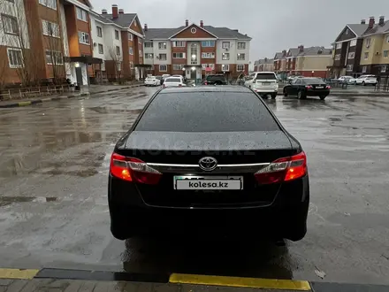 Toyota Camry 2013 года за 8 100 000 тг. в Актобе – фото 5