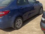 Kia Rio 2013 года за 1 800 000 тг. в Атырау – фото 2