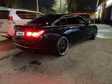 BMW 750 2012 года за 18 000 000 тг. в Алматы – фото 4