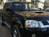 Nissan NP300 2010 года за 3 699 000 тг. в Астана