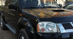 Nissan NP300 2010 года за 3 700 000 тг. в Астана