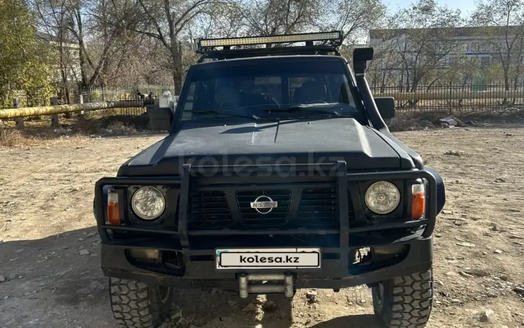 Nissan Patrol 1996 годаүшін2 100 000 тг. в Жезказган