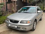 Mazda 626 1999 года за 3 400 000 тг. в Алматы – фото 4