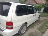 Kia Carnival 2002 года за 2 850 000 тг. в Алматы – фото 3