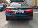 Toyota Camry 2012 года за 9 100 000 тг. в Актобе – фото 2