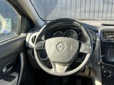 Renault Logan 2014 года за 2 400 000 тг. в Актобе – фото 9