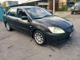 Mitsubishi Lancer 2005 года за 1 500 000 тг. в Алматы – фото 2