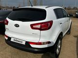 Kia Sportage 2013 года за 7 500 000 тг. в Актобе – фото 3