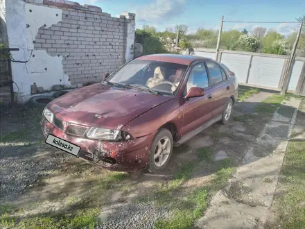 Mitsubishi Carisma 1995 годаүшін600 000 тг. в Актобе