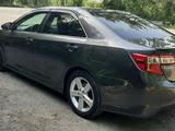 Toyota Camry 2013 года за 6 700 000 тг. в Актобе – фото 4