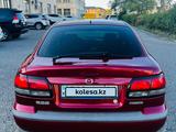 Mazda 626 1997 года за 2 000 000 тг. в Атырау – фото 3