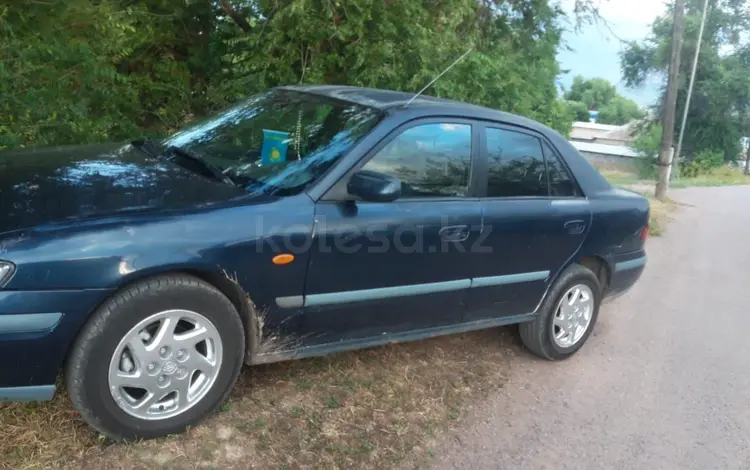 Mazda 626 1998 года за 1 500 000 тг. в Мерке