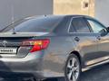 Toyota Camry 2013 года за 8 500 000 тг. в Жанаозен