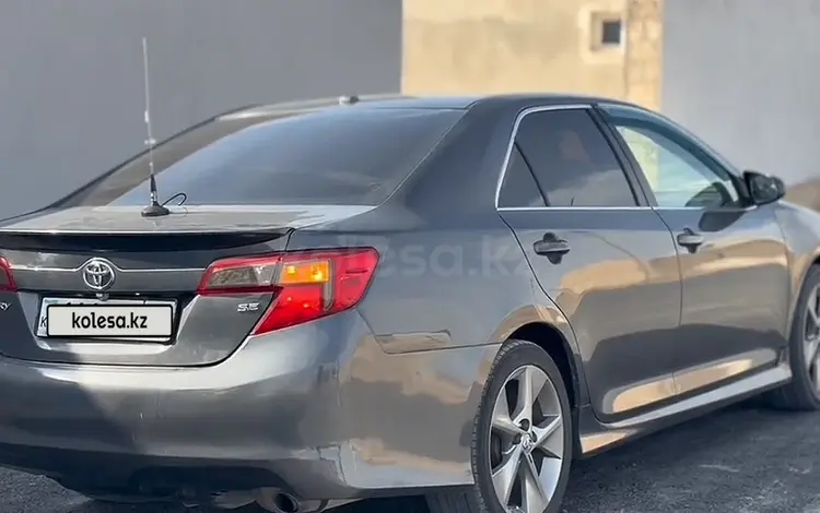Toyota Camry 2013 года за 8 500 000 тг. в Жанаозен