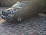 Kia Carnival 2002 годаүшін1 250 000 тг. в Шымкент – фото 2