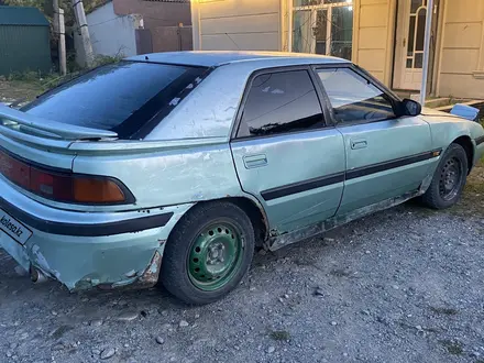 Mazda 323 1991 года за 370 000 тг. в Жансугуров – фото 3