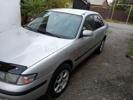 Mazda 626 1998 года за 2 200 000 тг. в Балпык би – фото 4