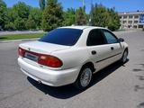 Mazda Familia 1995 года за 1 350 000 тг. в Шымкент – фото 3