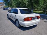 Mazda Familia 1995 года за 1 350 000 тг. в Шымкент – фото 4