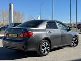 Toyota Corolla 2010 года за 5 300 000 тг. в Караганда – фото 2