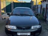 Mitsubishi Carisma 1996 года за 900 000 тг. в Астана – фото 2