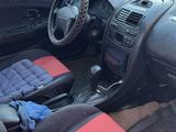 Mitsubishi Carisma 1996 года за 900 000 тг. в Астана – фото 4