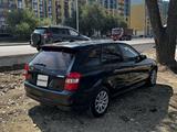 Mazda 323 1998 года за 1 600 000 тг. в Алматы – фото 2