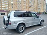 Suzuki Grand Vitara 2005 годаүшін4 600 000 тг. в Астана – фото 2