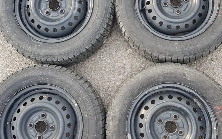 Зимние шины Yokohama с дисками за 90 000 тг. в Алматы