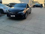 Toyota Camry 2015 года за 7 000 000 тг. в Актобе – фото 4