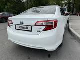 Toyota Camry 2013 года за 9 500 000 тг. в Атырау