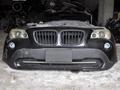 BMW E84 X1 бампер передний за 100 000 тг. в Астана