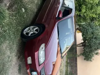 Mazda 323, 2002