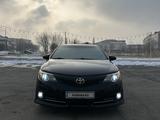 Toyota Camry 2013 годаfor9 200 000 тг. в Тараз