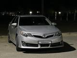 Toyota Camry 2014 года за 8 100 000 тг. в Бейнеу