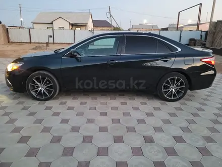 Toyota Camry 2018 года за 7 000 000 тг. в Атырау – фото 8