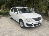 Renault Logan 2014 года за 1 350 000 тг. в Атырау – фото 2