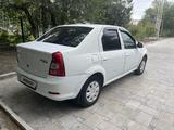 Renault Logan 2014 года за 1 350 000 тг. в Атырау – фото 4