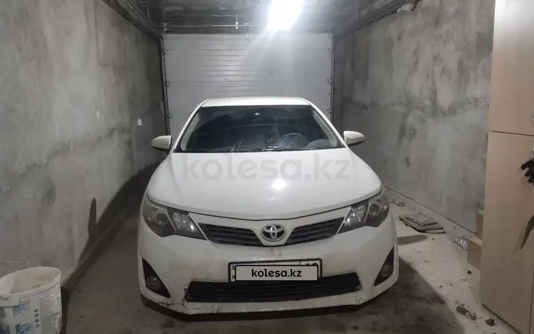 Toyota Camry 2013 года за 8 200 000 тг. в Жанаозен