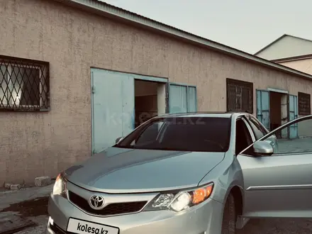 Toyota Camry 2013 года за 7 800 000 тг. в Жанаозен – фото 6