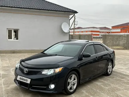 Toyota Camry 2012 года за 7 300 000 тг. в Жанаозен