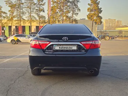 Toyota Camry 2015 года за 8 500 000 тг. в Алматы – фото 25