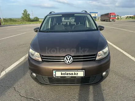 Volkswagen Touran 2012 года за 5 800 000 тг. в Астана