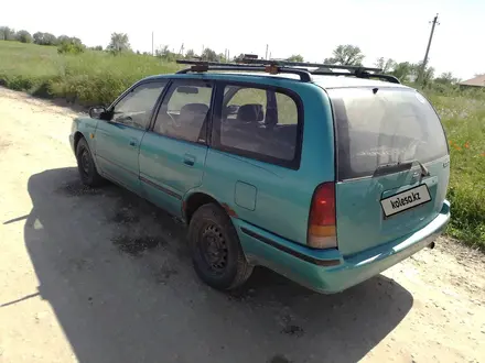 Nissan Primera 1993 года за 700 000 тг. в Отеген-Батыр – фото 5