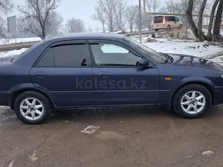 Mazda 323 2001 года за 1 600 000 тг. в Алматы – фото 2